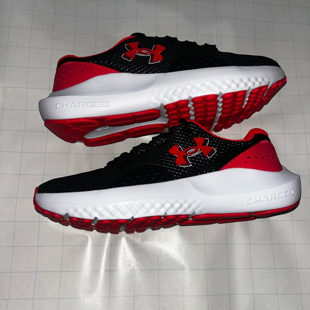 Under Armour women’s 6.5 Black and Red Sneakers